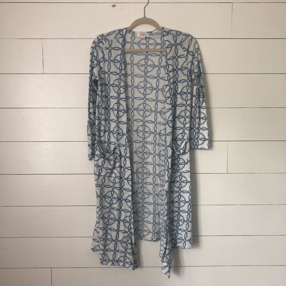 LulaRoe Cardigan. NWOT size small. Perfect cond.